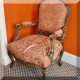 F15. Upholstered medallion back armchair.  